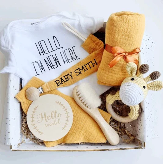 Gender-neutral baby gifts in yellow, green, and neutral colors suitable for any baby